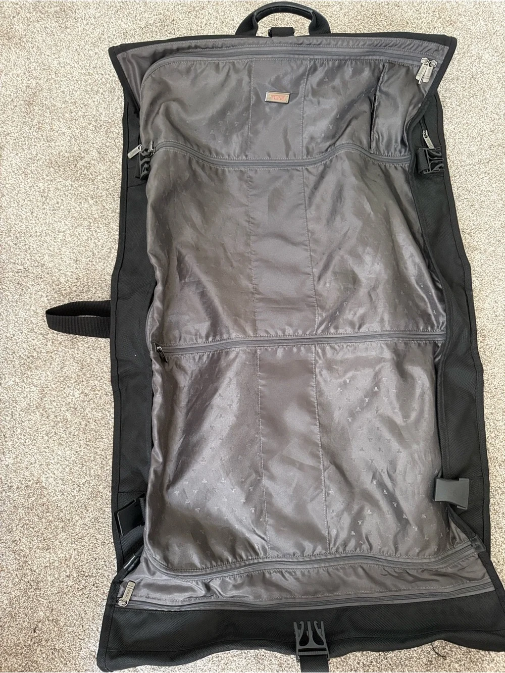 Tumi Bifold Black Travel Garment Bag with Multiple Front Pockets